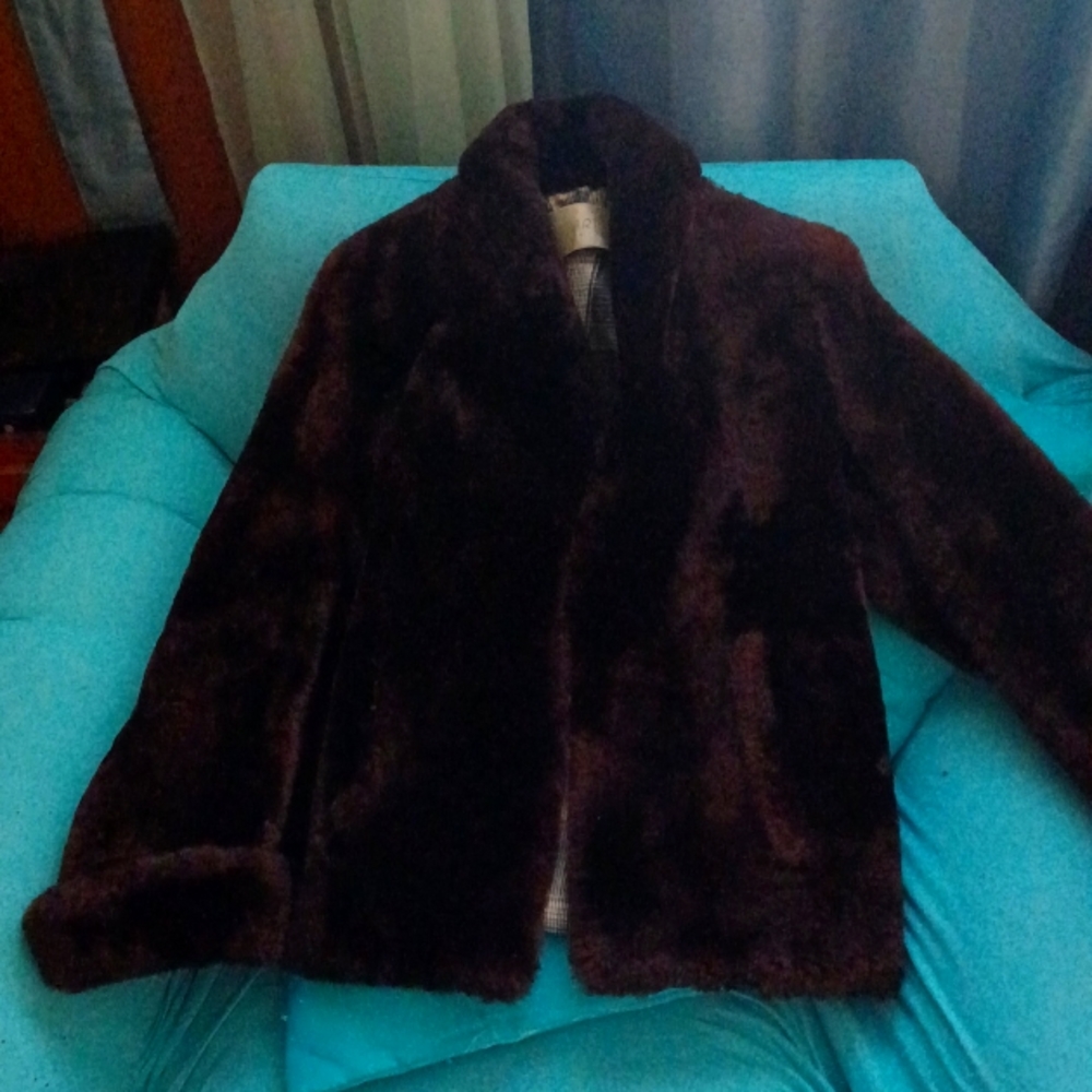 A mink coat by Stuart excellent condition $250 beautiful Brown originally $450 s